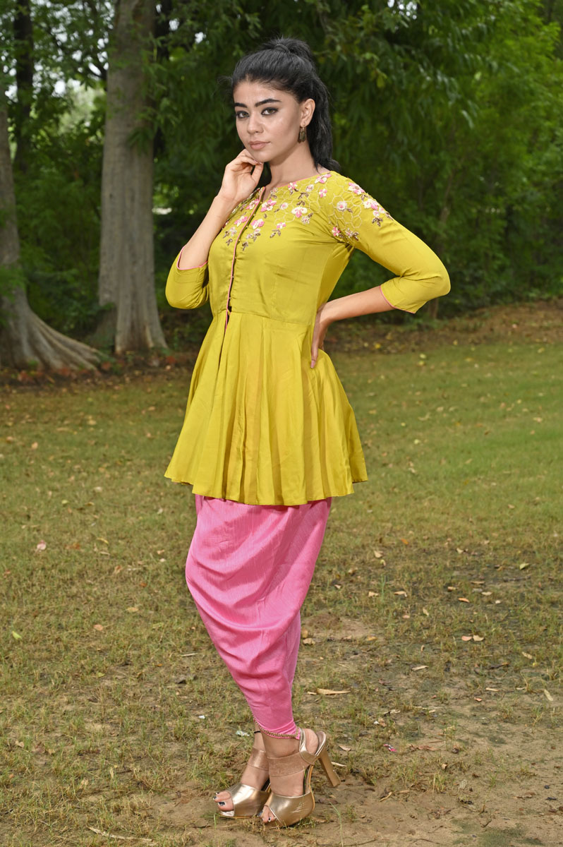 DEEP YELLOW PALAZZO PANT SET AND A SOFT PEPLUM STYLE CHIKAN TOP PAIRED WITH  A MATCHING DUPATTA AND LIGHT GOLD DETAILS  Seasons India